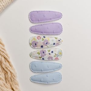 Hair clip with floral brooch